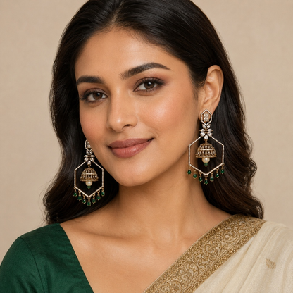 Model wearing emerald green geometric jhumka chandelier earrings