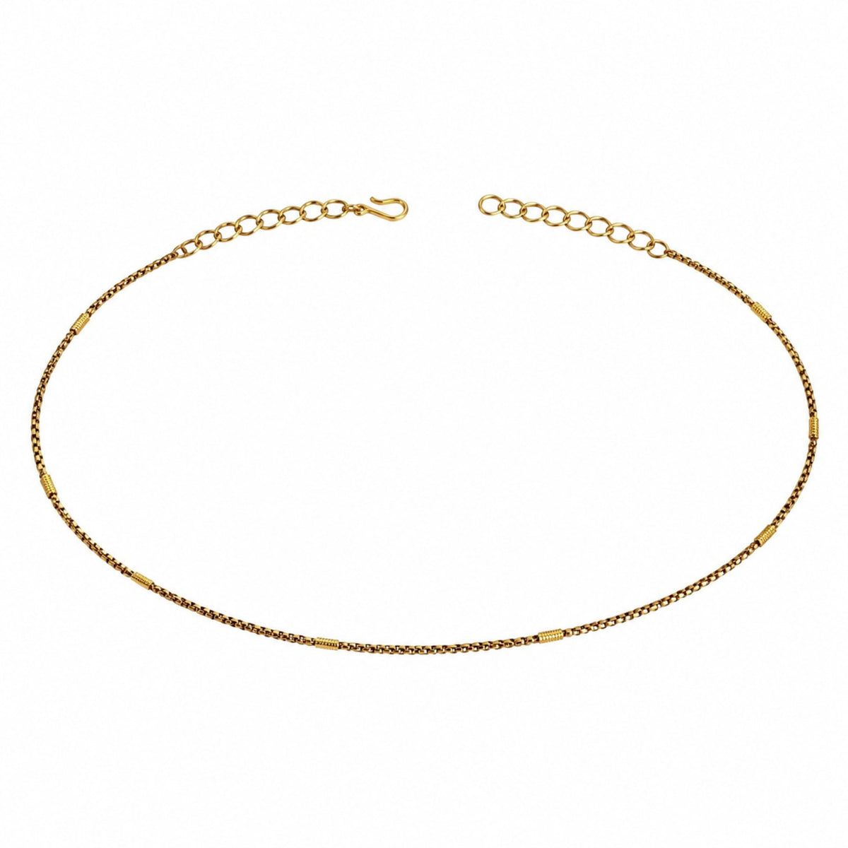 Adjustable gold-tone single-row hip chain with textured spacer accents on white background