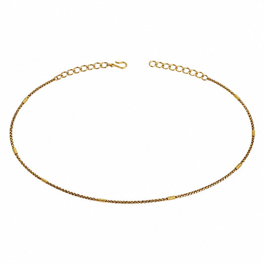 Adjustable gold-tone single-row hip chain with textured spacer accents on white background
