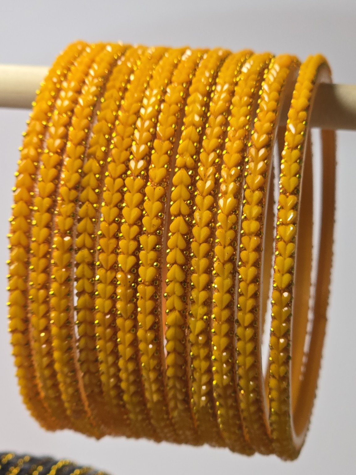 Heart Beats Pastel Turmeric glass bangle set with gold-dot heart detailing