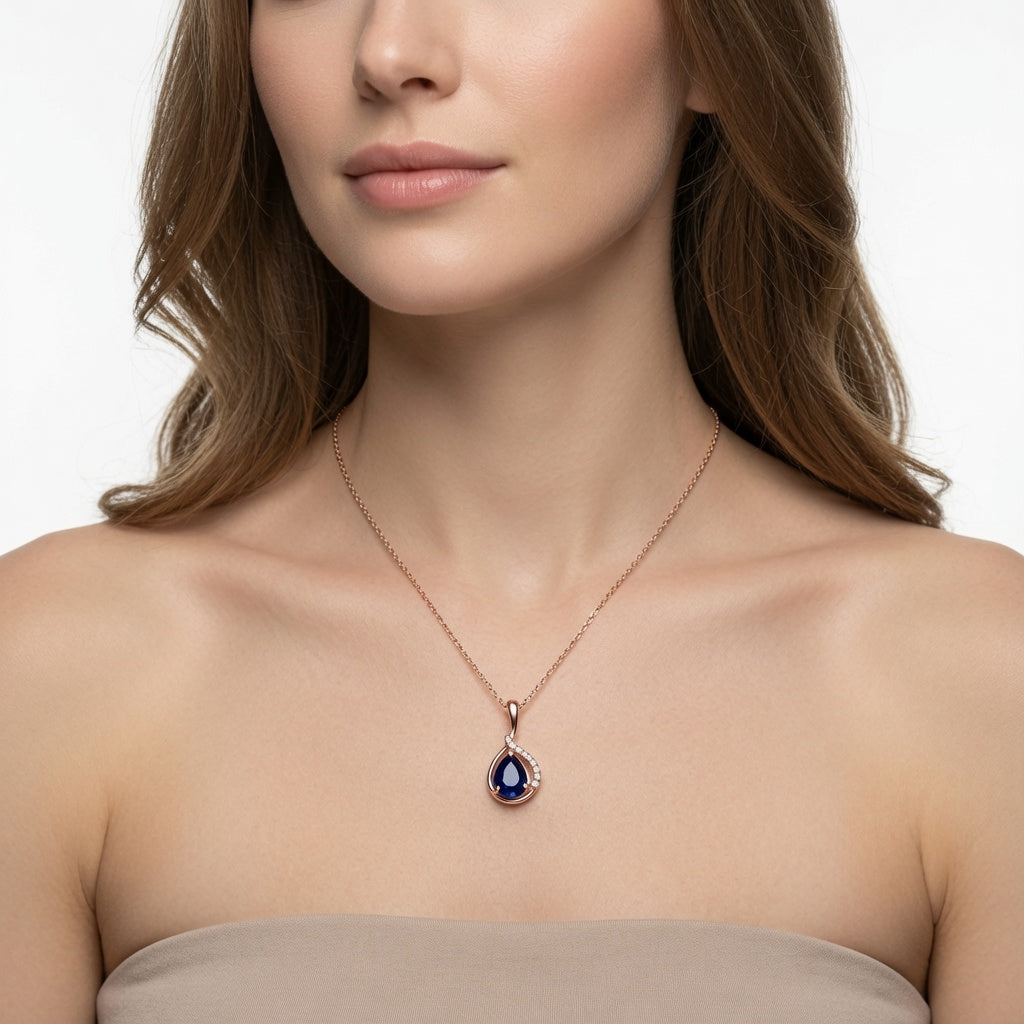 Blue drop pendant necklace crafted from 925 sterling silver by Belumiee, featuring a sleek blue teardrop-shaped pendant.
