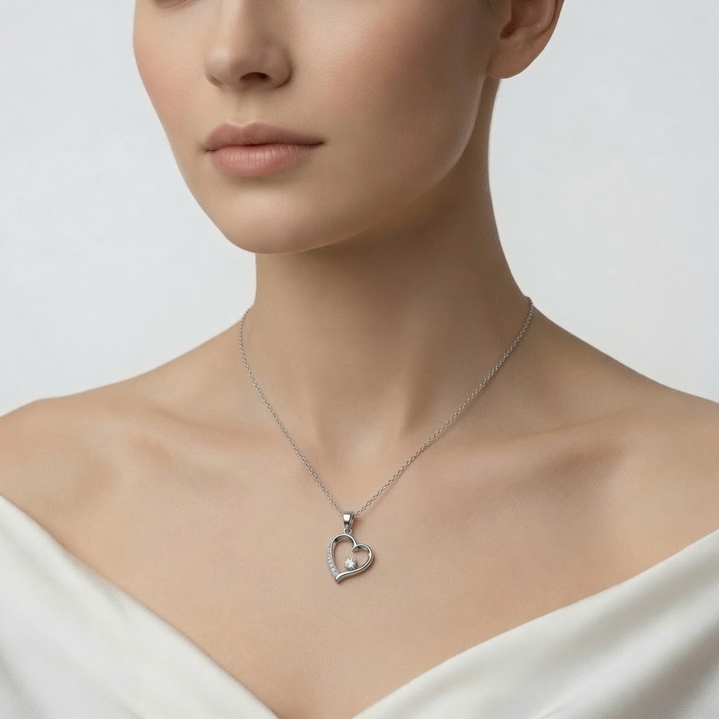 Sterling silver heart pendant necklace from Belumiee, featuring a polished heart-shaped charm on a delicate chain.