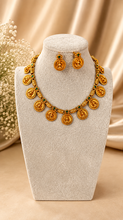 Traditional Lakshmi Coin Temple Necklace Set by Belumiee featuring intricate gold-toned jewelry with coin and temple motifs.