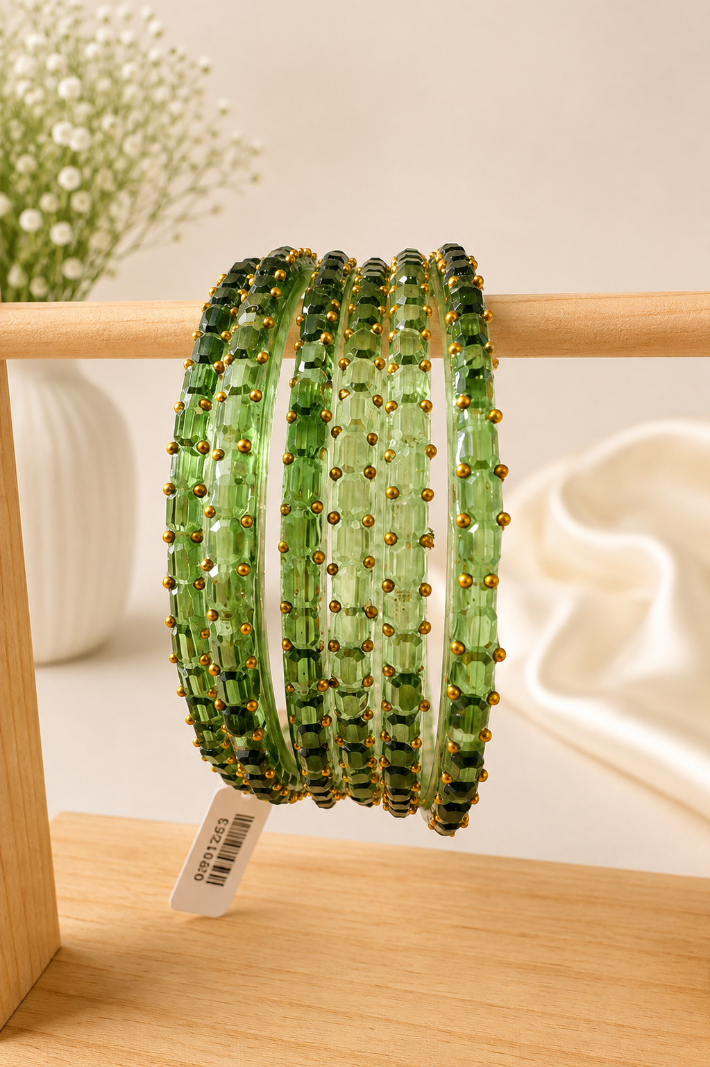 Mehandi green Navrang Sparkle Glass Bangles Set by Belumiee, featuring shimmering glass bangles with intricate designs for festive wear.