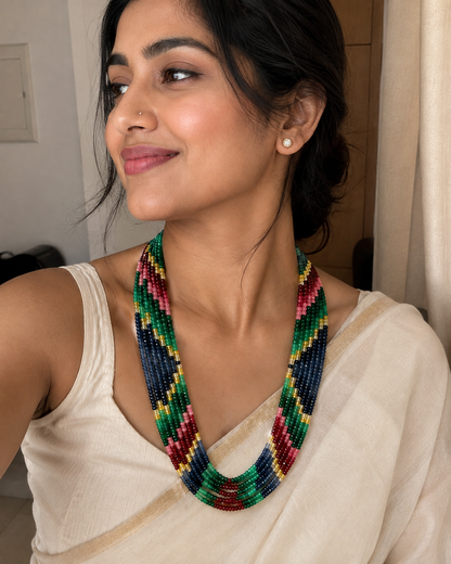 Multicolour beaded layered necklace by Belumiee featuring vibrant multicolored beads and a stylish layered design.
