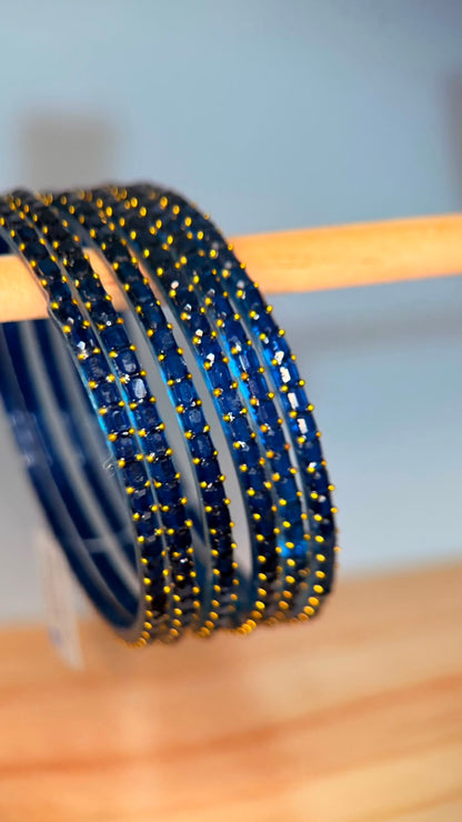 Navy blue Navrang Sparkle Glass Bangles set by Belumiee, featuring shimmering glass bangles with intricate designs.
