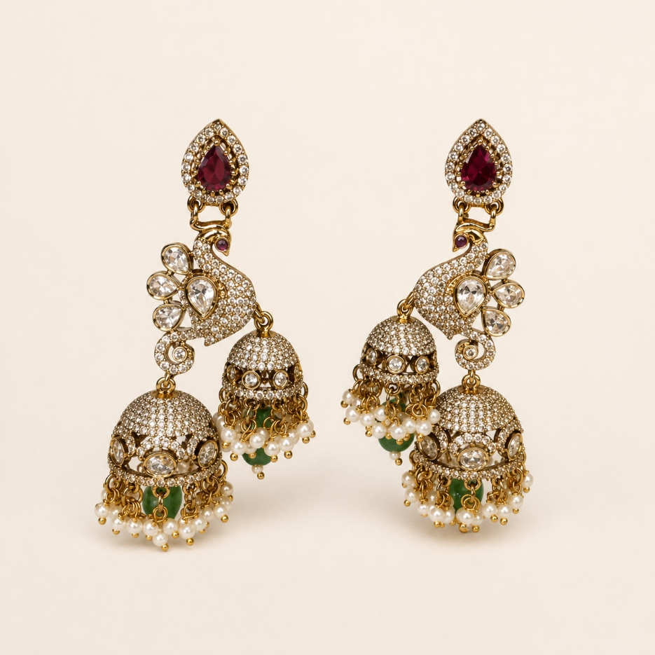Antique gold peacock double jhumka earrings in Ruby with pearl-style drops
