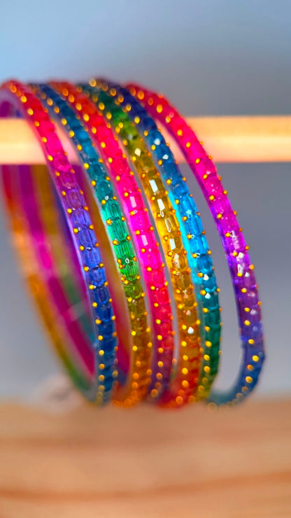 Belumiee Navrang Sparkle Glass Bangles Set featuring colorful rainbow glass bangles with shimmering, vibrant designs.