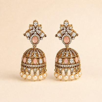 Gold-tone royal crystal dome jhumka earrings in Blush Pink with pearl-style drops