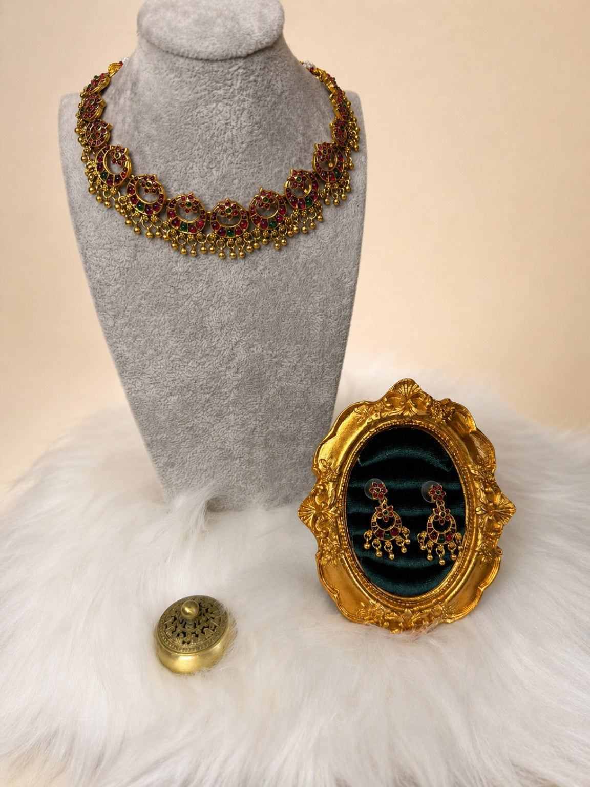 Ruby and green peacock choker necklace set featuring intricate design and vibrant gemstones by Belumiee.