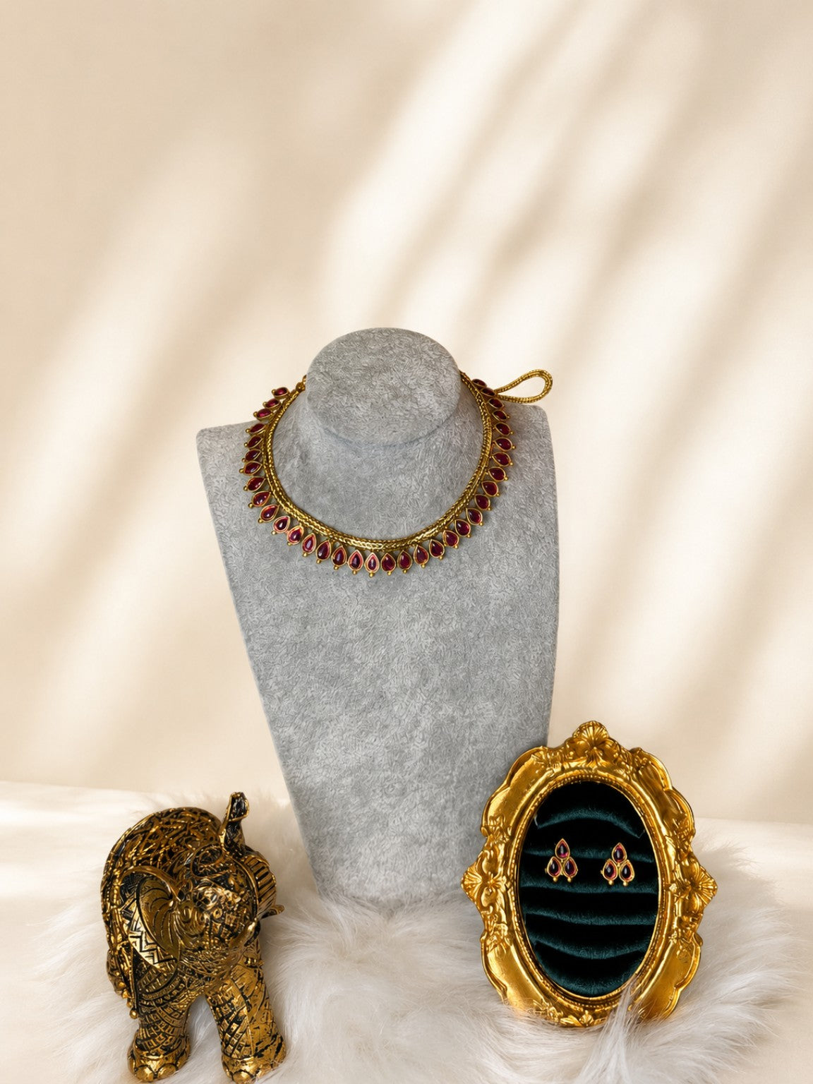 Gold-tone teardrop stone traditional necklace set with ruby accents from Belumiee, featuring intricate design and elegant craftsmanship.