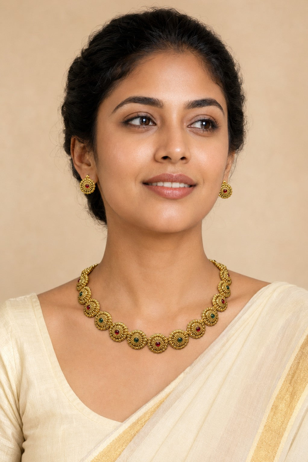 Traditional Ruby and Emerald Floral Disc Necklace Set by Belumiee, featuring vibrant gemstones and intricate design.